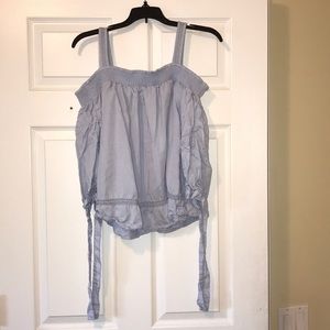 Blue off the shoulder shirt with straps